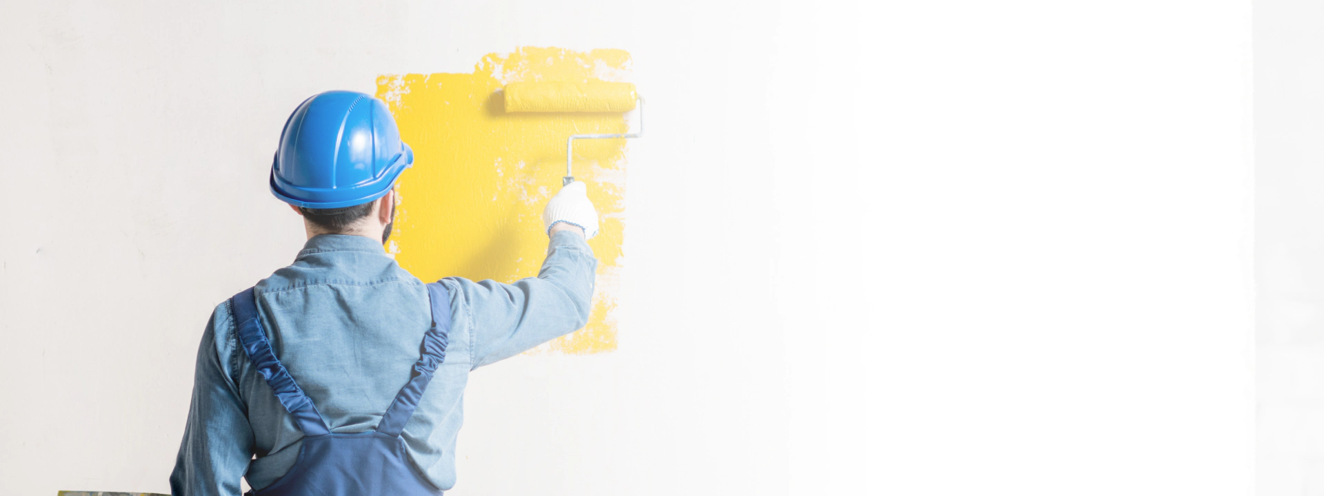 wall=painting with yellow paint